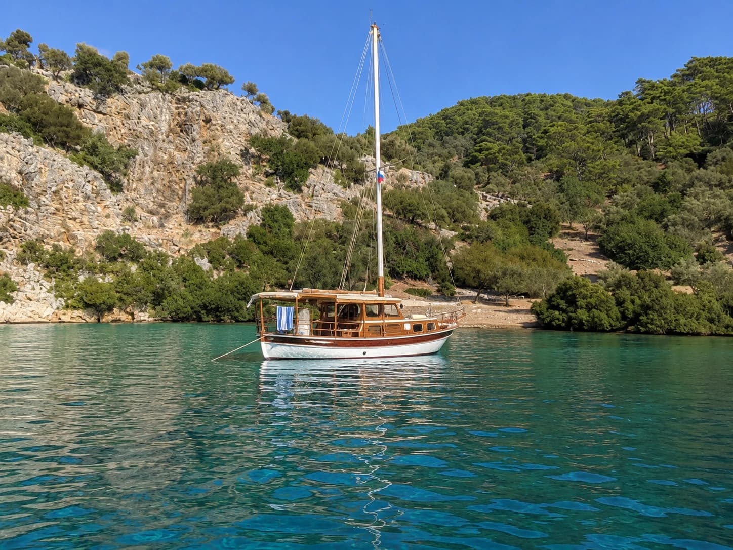 Day boat in a quiet cove near Saint-Tropez
