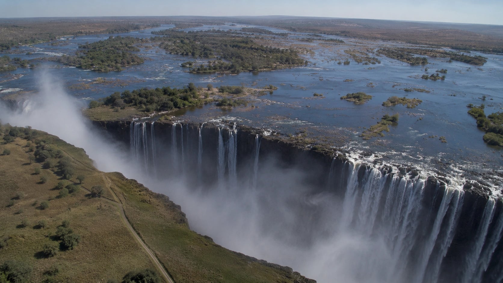 The upper Zambezi River above Victoria Falls at dusk, northwestern Zimbabwe.
