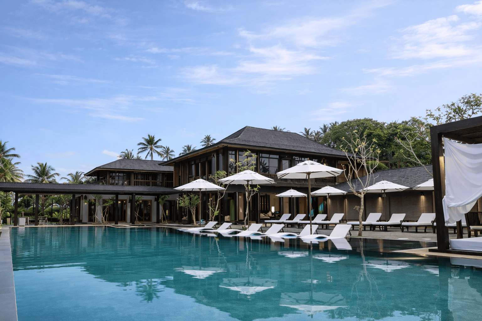 Quiet coastal villa setting with sea view.